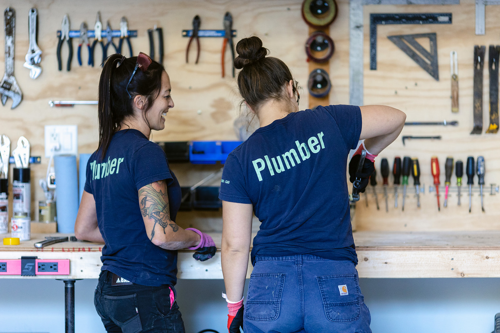 two women plumbers