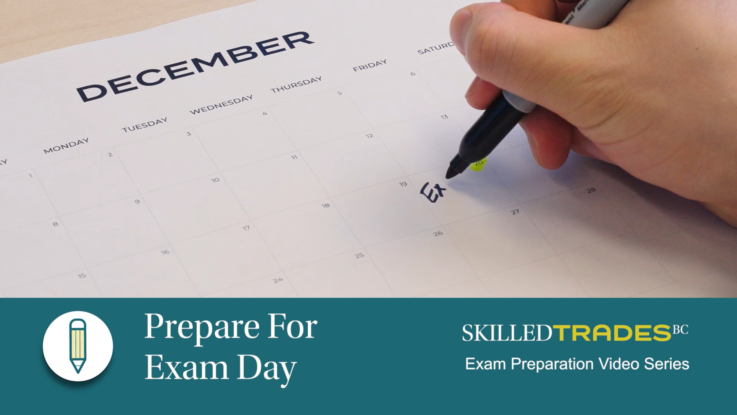 pen writing on calendar