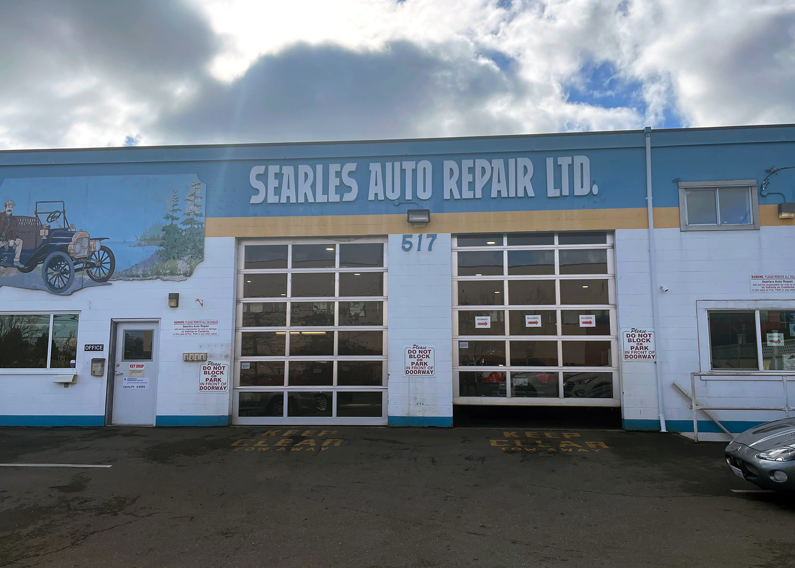 auto shop exterior with garage doors 