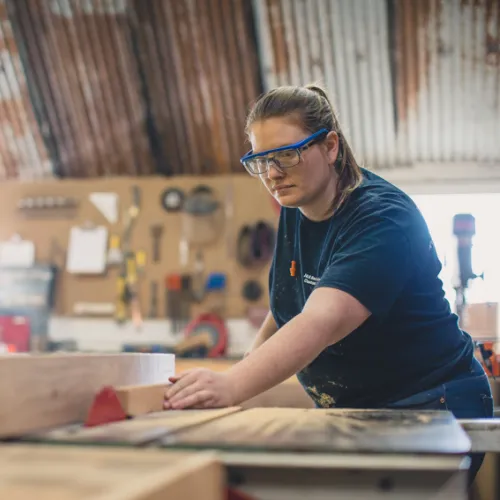carpenter working in shop