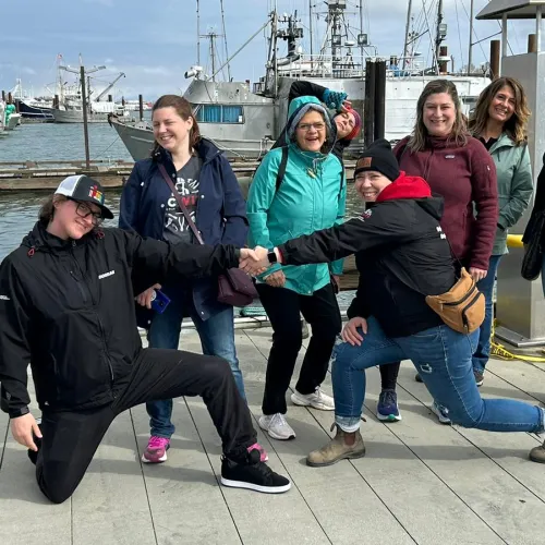 Group of individuals at a dock